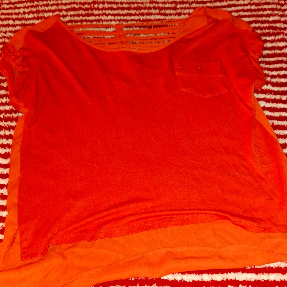 Rust colored top by Miss Daisy's is 🔥